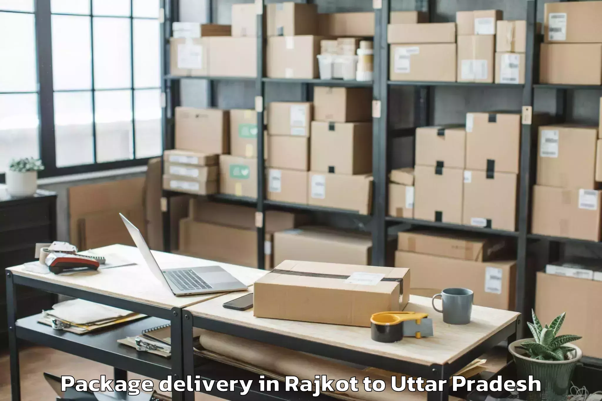 Professional Rajkot to Nichlaul Package Delivery